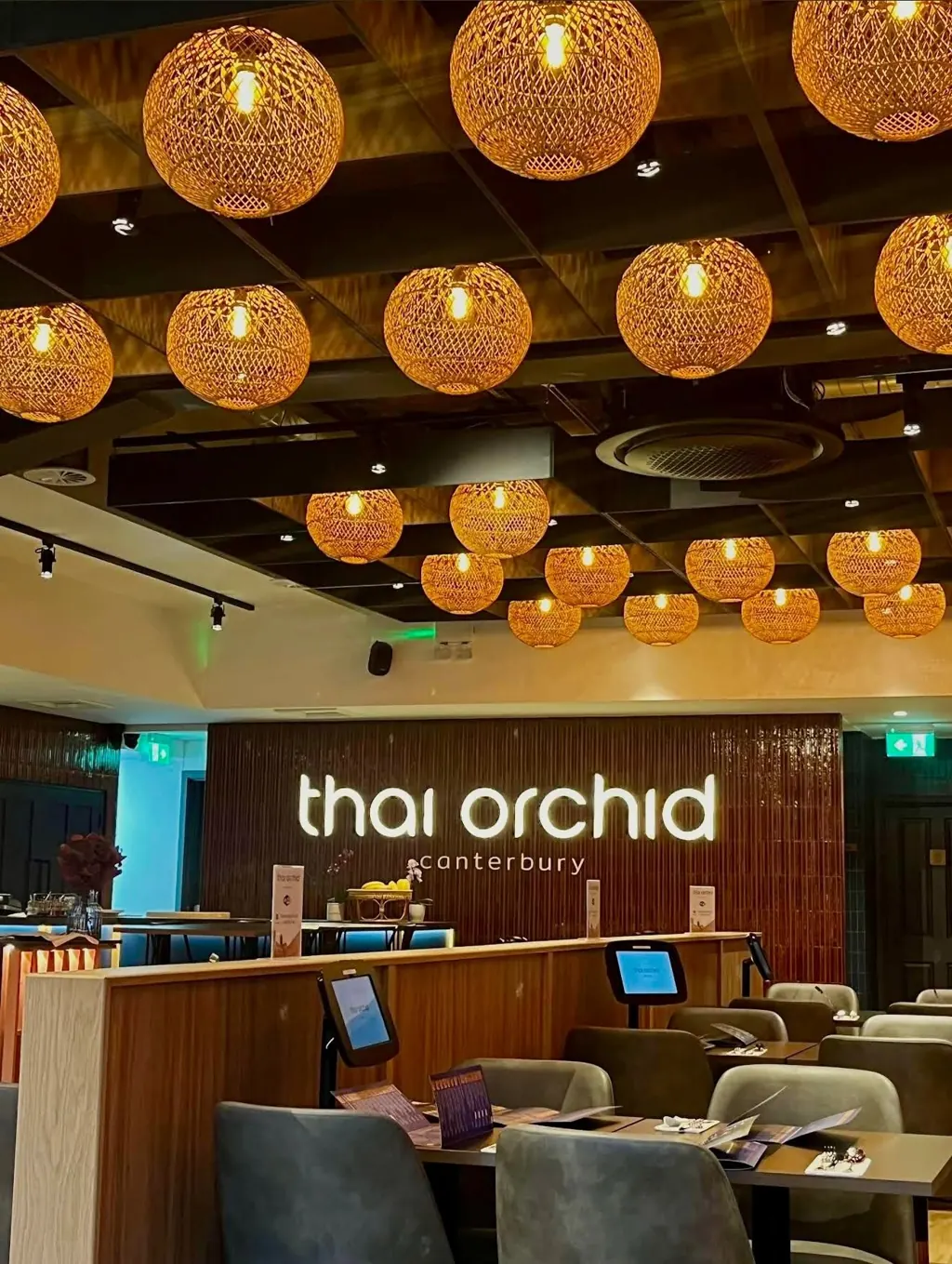 Rattan lanterns above the Thai Orchid dining room